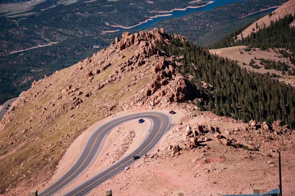 A curved road in a rocky mountain