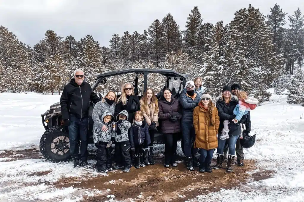 Family enjoying a winter UTV tour near Woodland Park with Great Outdoors Adventures.