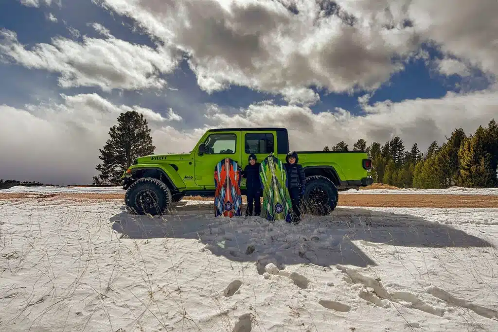 Guided Jeep tour on snowy mountain roads near Woodland Park.