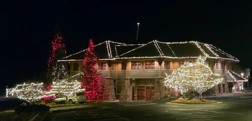 Exterior of Tweeds Fine Furnishings in Woodland Park, a popular stop for rustic home décor and Christmas shopping